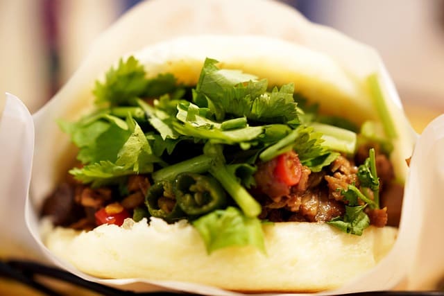 Arepas with salad and cilantro - image by takedahrs on pixabay