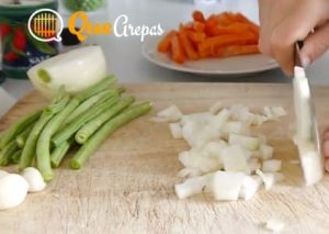 Chopping the ingredients for arroz con pollo - quearepas.com